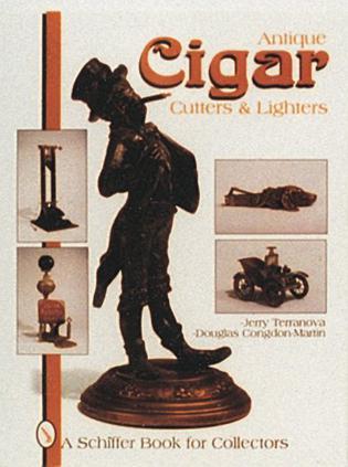 Antique cigar cutters & lighters